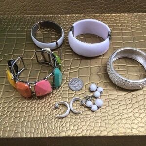 Miscellaneous jewelry lot. Four bracelets, and two pair of earrings.